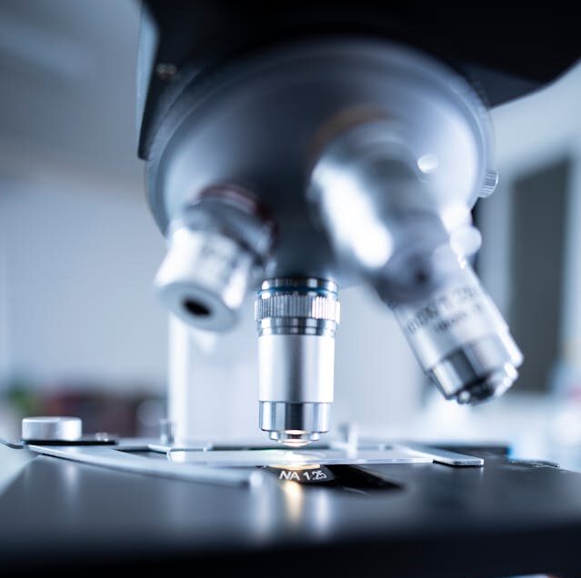 Shallow Focus Photography of Microscope
